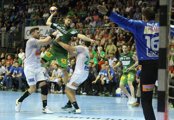 20.05.2018, xcsx, Handball EHF Cup Final 4, Handball EHF Cup Final 4, Spiel um Platz 3, SC Magdeburg - Frisch auf Göppingen, emspor, v.l. Jacob Bagersted (Frisch Auf! Göppingen), Marko Bezjak (SC Magdeburg), Marco Rentschler (Frisch Auf Göppingen), Zweikampf, battle for the ball, beim Wurf gegen Primosz Prost (Frisch Auf! Göppingen) Magdeburg