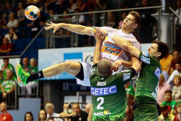 SC Magdeburg vs Frisch Auf Göppingen. vl Zeljko Musa (Magdeburg, 2), Sebastian Heymann (Göppingen, 10), Nemanja Zelenovic (Magdeburg, 42) Zweikampf, Duell, Kampf, tackle SC Magdeburg vs Frisch Auf Göppingen, Handball, Ottostadt Magdeburg EHF Cup Finals 2018, Saison 2017 2018, 20.05.2018 Magdeburg Copyright: xTaegerEibner-Pressefotox EP_taeger