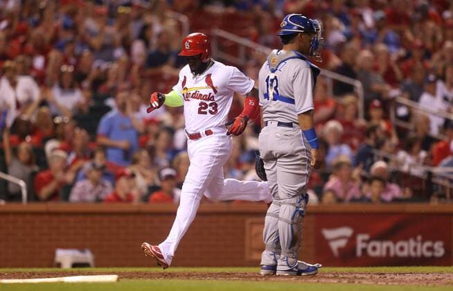 St. Louis Cardinals Marcell Ozuna scores on a RBI double by Tyler O Neill in the fifth inning against the Kansas City Royals at Busch Stadium in St. Louis on May 21, 2018.  SLP2018052116 BILLxGREENBLATT