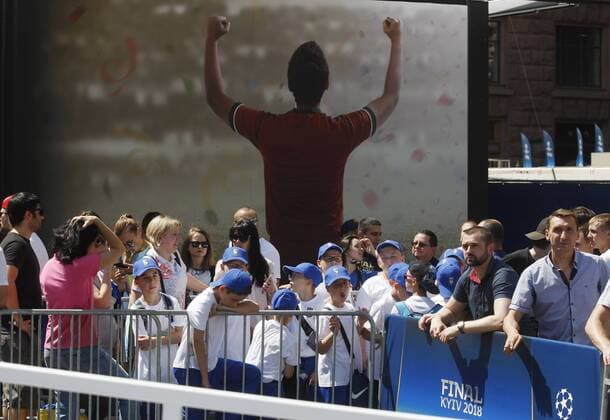 May 24, 2018 - Kiev, Ukraine - Visitors wait for taking a photo with the Champions league trophies, during the opening ceremony of the Champions Festival in the UEFA Champions League Final fan zone in Kyiv, Ukraine, 24 May, 2018. The Champions Festival will be held in fan zone on May 24-27 in Kyiv during the final matches of the UEFA ChampionsÃ¢â‚¬â ¢ League among men and women. Real Madrid v Liverpool - UEFA Champions League Final Previews  - ZUMAn230 20180524_zaa_n230_604 Copyright: xStrx