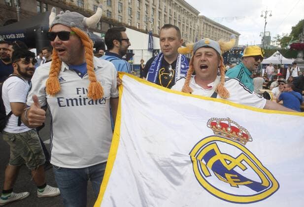 May 25, 2018 - Kiev, Ukraine - Real Madrid fans react in the the Champions league fan zone, Kiev, Ukraine, 25 May 2018. Real Madrid will face Liverpool FC in the UEFA Champions League final at the NSC Olimpiyskiy stadium on 26 May 2018. Real Madrid vs Liverpool FC - ZUMAg194 20180525_zap_g194_003 Copyright: xSergxGlovnyx