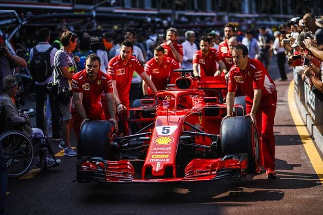 May 25, 2018 - Montecarlo, Monaco - Mechanics pushing the 05 Sebastian Vettel from Germany with Scuderia Ferrari SF71H car during the Monaco Formula One Grand Prix at Monaco on 25th of May, 2018 in Montecarlo, Monaco. F1 Grand Prix of Monaco - Previews  - ZUMAn230 20180525_zaa_n230_903 Copyright: xXavierxBonillax