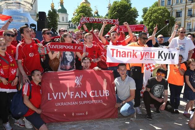 Real Madrid v Liverpool UEFA Champions League Final The Kiev Liverpool Fan Club sing in front of a giant Champions League Trophy before the UEFA Champions League Final at the Olympic Stadium, Kiev Content Not Available For UK Newspapers Copyright: xPaulxChestertonx FIL-11844-0023