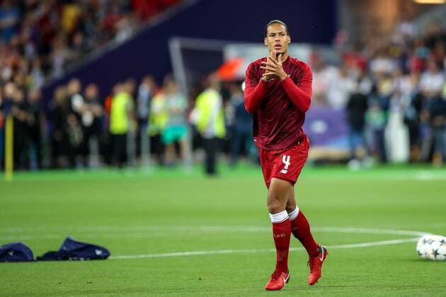 26th May 2018, Kiev Olympic Stadium, Kiev, Ukraine; UEFA Champions League Final, Real Madrid versus Liverpool; Virgil Van Dijk of Liverpool applauds the fans as he comes on to the pitch to warm up  ActionPlus12029118 StevexFeeney