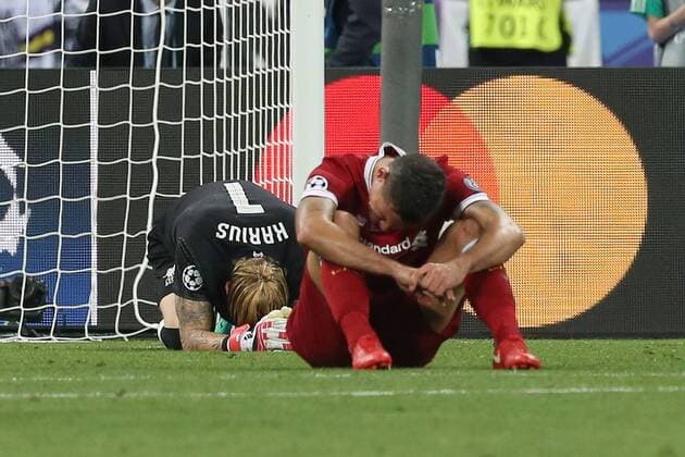 Real Madrid v Liverpool UEFA Champions League Final Loris Karius of Liverpool and Dejan Lovren of Liverpool are distraught at the end of the UEFA Champions League Final at the Olympic Stadium, Kiev Content Not Available For UK Newspapers Copyright: xPaulxChestertonx FIL-11844-0162