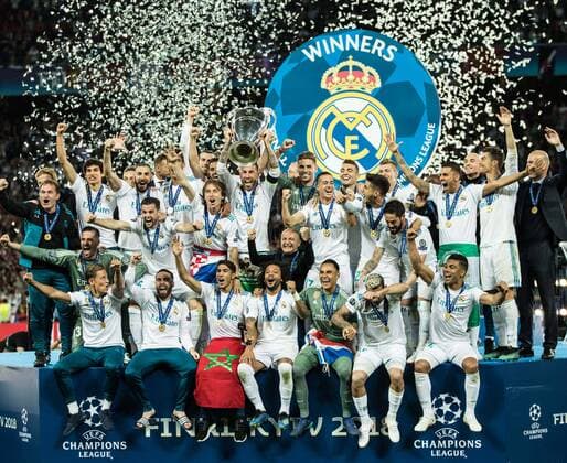 (180527) -- KIEV, May 27, 2018 -- Sergio Ramos (C) of Real Madrid holds the trophy after winning the UEFA Champions League final match between Liverpool and Real Madrid in Kiev, Ukraine on May 26, 2018. Real Madrid claimed the title with 3-1. ) (SP)UKRAINE-KIEV-CHAMPIONS LEAGUE-LIVERPOOL-REAL MADRID Wuzhuang 