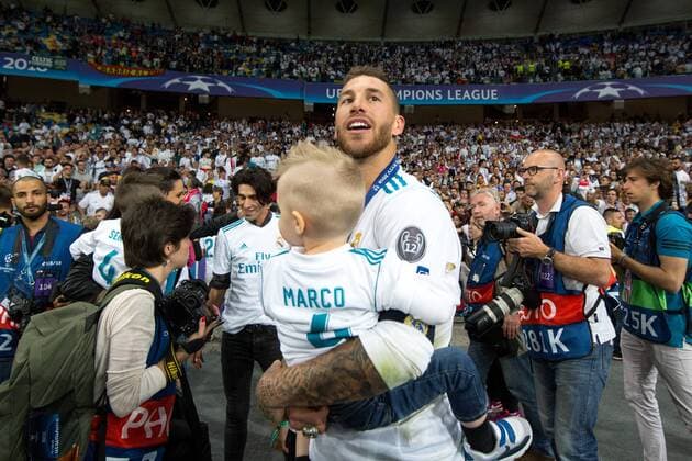 SOCCER - UEFA CL final, Liverpool vs Real KIEV,UKRAINE,26.MAY.18 - SOCCER - UEFA Champions League, final, Liverpool FC vs Real Madrid CF. Image shows Sergio Ramos (Madrid) with kid. GEPAxpictures xMaticxKlansek