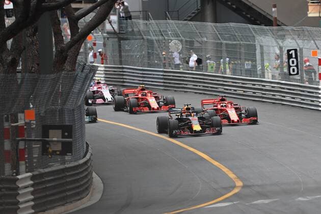27th May 2018, Circuit de Monaco, Monaco, Monte Carlo; Monaco Formula 1 Grand Prix, race day; Aston Martin Red Bull Racing TAG Heuer, Daniel Ricciardo leads the race start into corner 1 ahead of Vettel  ActionPlus12029682 Octane