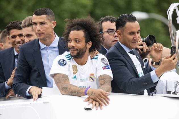 Fußball, CL-Sieger Real Madrid wird in Madrid gefeiert Real Madrid Cristiano Ronaldo, Marcelo and Keylor Navas during the celebration of the Thirteen Champions League at Cibeles Fountain in Madrid, Spain. May 27, 2018.  (20180528007)