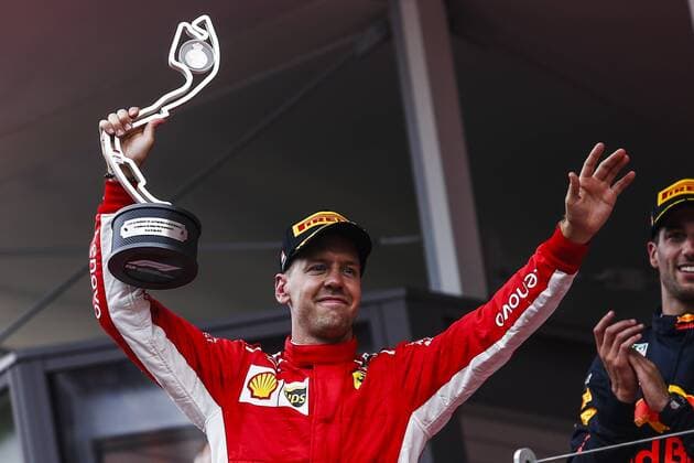 May 27, 2018 - Montecarlo, Monaco - 05 Sebastian Vettel from Germany with Scuderia Ferrari SF71H celebrating his second place at the podium during the Race of Monaco Formula One Grand Prix at Monaco on 27th of May, 2018 in Montecarlo, Monaco. F1 Grand Prix of Monaco  - ZUMAn230 20180527_zaa_n230_852 Copyright: xXavierxBonillax