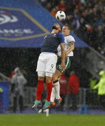 28th May 2018, Stade de France, Paris, France; International football friendly, France versus Republic of Ireland; Olivier Giroud (France) wins an aerial battle with Kevin Long (Republic of Ireland)  ActionPlus12030449 AshleyxCahill