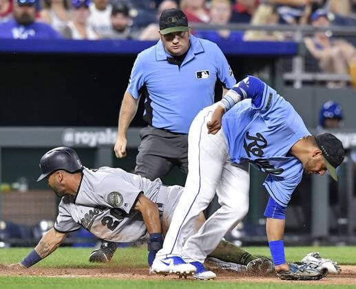 May 28, 2018 - Kansas City, MO, USA - Minnesota Twins Eddie Rosario steals third under the tag of Kansas City Royals third baseman Ramon Torres in the eighth inning during Monday s baseball game on May 28, 2018, at Kauffman Stadium in Kansas City, Mo. Twins vs Royals - ZUMAm67_ 20180528_zaf_m67_028 Copyright: xJohnxSleezerx