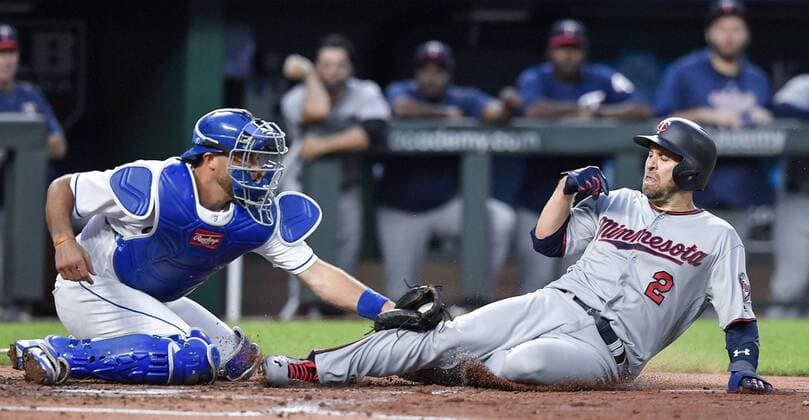 May 29, 2018 - Kansas City, MO, USA - Kansas City Royals catcher Drew Butera, left, tags out the Minnesota Twins Brian Dozier at the plate on an RBI single by Miguel Sano that scored Ehire Adrianza in the third inning on Tuesday, May 29, 2018, at Kauffman Stadium in Kansas City, Mo. Minnesota at Kansas City - ZUMAm67_ 20180529_zaf_m67_041 Copyright: xJohnxSleezerx