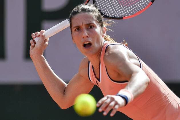 Themen der Woche - SPORT KW22 Bilder des Tages - SPORT (180603) -- PARIS, June 3, 2018 -- Andrea Petkovic of Germany returns a shot during the women s singles third round match against 1st seeded Simona Halep of Romania at the French Open Tennis Tournament 2018 in Paris, France on June 2, 2018. Andrea Petkovic lost 0-2. ) (SP)FRANCE-PARIS-TENNIS-FRENCH OPEN-DAY 7 ChenxYichen 