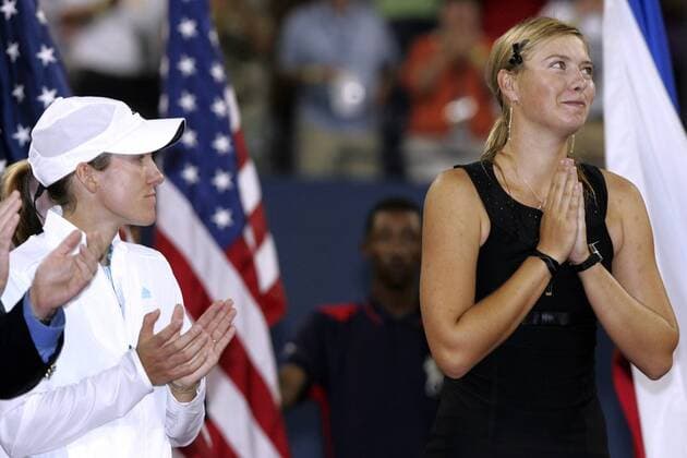 - NEW YORK, USA : Belgian Justine Henin-Hardenne (L) and Maria Sharapova of Russia (R) during the award ceremony after their women final match at the US Open Tennis tournament, Saturday 09 September 2006, in Flushing Meadows, New York. Sharapova won 6-4, 6-4. DIDIERxMOSSIAT  x5013964x