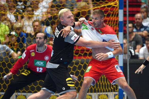 v.li:Patrick WIENCEK (GER),Myrhol BJARTE (NOR),Aktion,Zweikampf,Textilprobe. Handball Laenderspiel der Maenner Deutschland (GER)-Norwegen (NOR), am 06.06.2018 Olympiahalle in Muenchen.