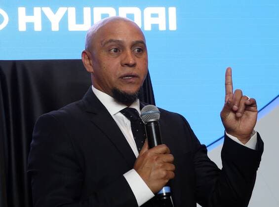 MOSCOW, RUSSIA â€“ JINE 8, 2018: Brazilian football player Roberto Carlos at the opening of the exhibition The History Makers presented by FIFA Partner Hyundai and hosted by the FIFA World Football Museum at the Hyundai Motorstudio Moscow at Novy Arbat (New Arbat) Street ahead of the forthcoming FIFA World Cup WM Weltmeisterschaft Fussball Russia 2018. Vladimir Gerdo TASS  TS083293