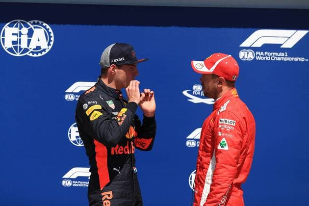 9th June 2018, Circuit Gilles-Villeneuve, Montreal, Canada; Canadian Formula One Grand Prix, qualification; Pole sitter Scuderia Ferrari, Sebastian Vettel talks with 3rd placed Red Bull Racing TAG Heuer, Max Verstappen  ActionPlus12035025 Octane