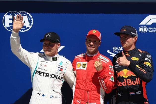 9th June 2018, Circuit Gilles-Villeneuve, Montreal, Canada; Canadian Formula One Grand Prix, qualification; Scuderia Ferrari, Sebastian Vettel takes pole followed by Mercedes AMG Petronas Motorsport; Valtteri Bottas and Aston Martin Red Bull Racing TAG Heuer, Max Verstappen  ActionPlus12035029 Octane