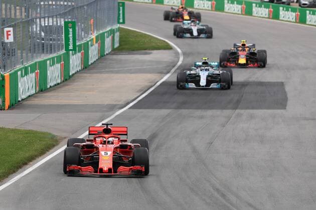 10th June 2018, Circuit Gilles-Villeneuve, Montreal, Canada; Canadian Formula One Grand Prix, race day; Scuderia Ferrari, Sebastian Vettel leads as the safety car pulls off  ActionPlus12035549 Octane