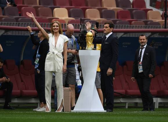 (180614) -- MOSCOW, June 14, 2018 -- Spain s Iker Casillas (R, front) presents the World Cup trophy prior to the opening ceremony of the 2018 FIFA World Cup WM Weltmeisterschaft Fussball in Moscow, Russia, on June 14, 2018. ) (SP)RUSSIA-MOSCOW-2018 WORLD CUP-TROPHY ChenxCheng 
