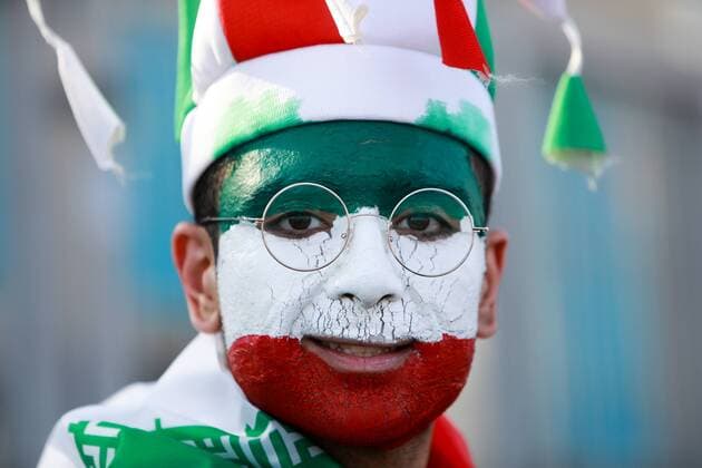 WM 2018, Fans ST PETERSBURG, RUSSIA â€“ JUNE 15, 2018: Iran s football fan with his national flag painted on his face seen outside Saint Petersburg Stadium ahead of their 2018 FIFA World Cup WM Weltmeisterschaft Fussball Group B match against Morocco. Sergei Konkov TASS  TS08461D