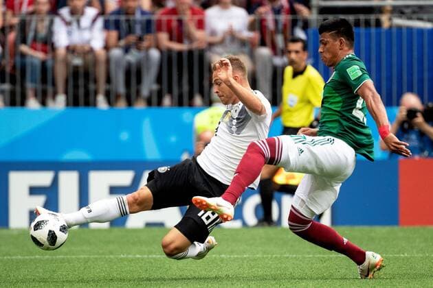 180617 Joshua Kimmich of Germany and Jesus Gallardo of Mexico during the FIFA World Cup WM Weltmeisterschaft Fussball group stage match between Germany and Mexico on June 17, 2018 in Moscow. Photo: Petter Arvidson BILDBYRAN kod PA 92069 Copyright: PETTERxARVIDSON BB180617PA045