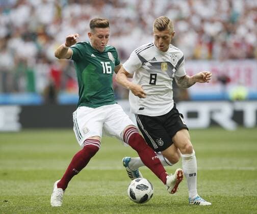 Hector Herrera of Mexico tackles Toni Kroos of Germany during the FIFA World Cup WM Weltmeisterschaft Fussball 2018 Group F match at the Luzhniki Stadium, Moscow. Picture date 17th June 2018. Picture credit should read: David Klein Sportimage EDITORIAL USE ONLY. No use with unauthorised audio, video, data, fixture lists, club league logos or live services. Online in-match use limited to 120 images, no video emulation. No use in betting, games or single club league player publications.