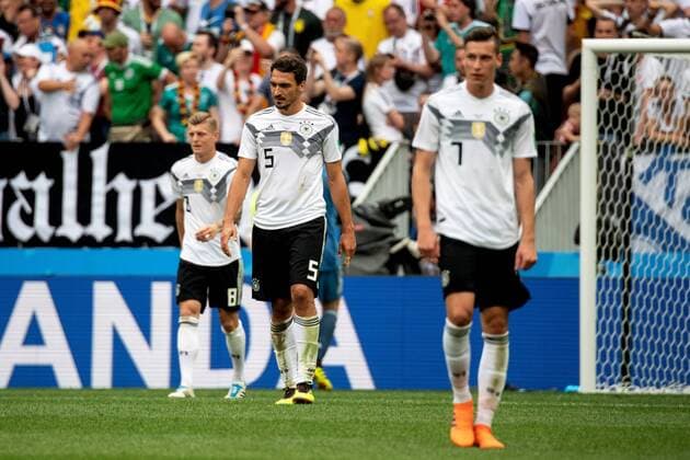 180617 Mats Hummels and Julian Draxler of Germany looks dejected after 0-1 during the FIFA World Cup WM Weltmeisterschaft Fussball group stage match between Germany and Mexico on June 17, 2018 in Moscow. Photo: Petter Arvidson BILDBYRAN kod PA 92069 Copyright: PETTERxARVIDSON BB180617PA054