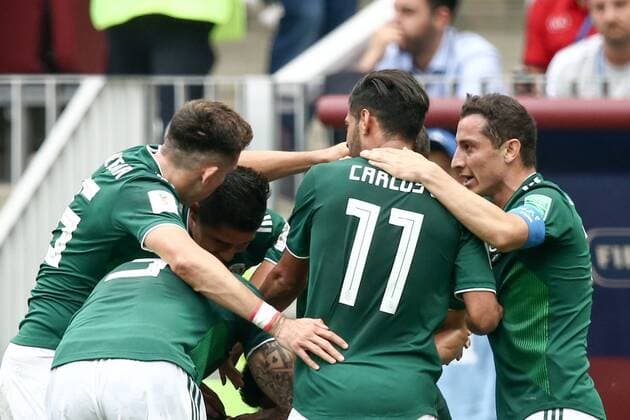 MOSCOW, RUSSIA - JUNE 17, 2018: Mexico s players celebrate scoring in the in the 2018 FIFA World Cup WM Weltmeisterschaft Fussball Group F football match against Germany at Luzhniki Stadium. Valery Sharifulin TASS  TS084C57