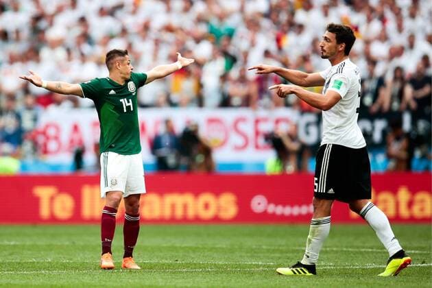 MOSCOW, RUSSIA - JUNE 17, 2018: Mexico s Javier Hernandez (L) and Germany s Mats Hummels in their 2018 FIFA World Cup WM Weltmeisterschaft Fussball Group F football match at Luzhniki Stadium. Denis Tyrin TASS  TS084C72
