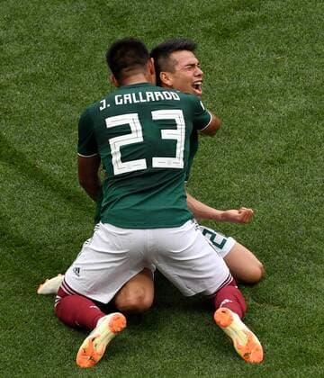 (180617) -- MOSCOW, June 17, 2018 -- Hirving Lozano (R) of Mexico celebrates his scoring during a group F match between Germany and Mexico at the 2018 FIFA World Cup WM Weltmeisterschaft Fussball in Moscow, Russia, June 17, 2018. ) (SP)RUSSIA-MOSCOW-2018 WORLD CUP-GROUP F-GERMANY VS MEXICO WangxYuguo 