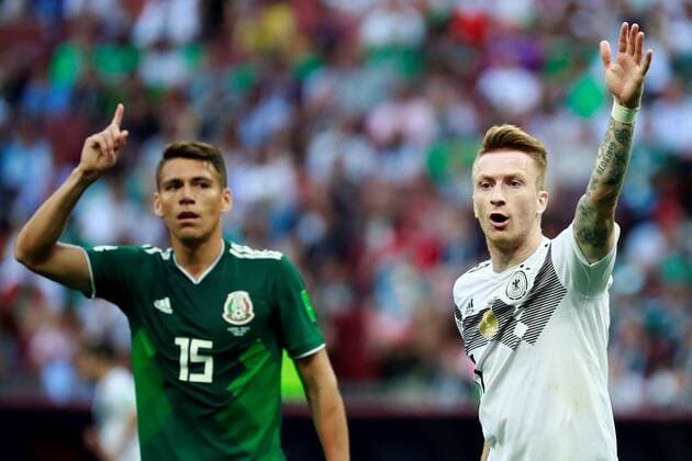 Mexican defender Hector Moreno (L) and German forward Marco Reus during the FIFA World Cup WM Weltmeisterschaft Fussball 2018 Group F soccer match between Germany and Mexico, in Moscow, Russia, 17 June 2018. GERMANY VS. MEXICO !ACHTUNG: NUR REDAKTIONELLE NUTZUNG!  Copyright: xJosexMendezx FWC09-143 20180617-636648573105771422