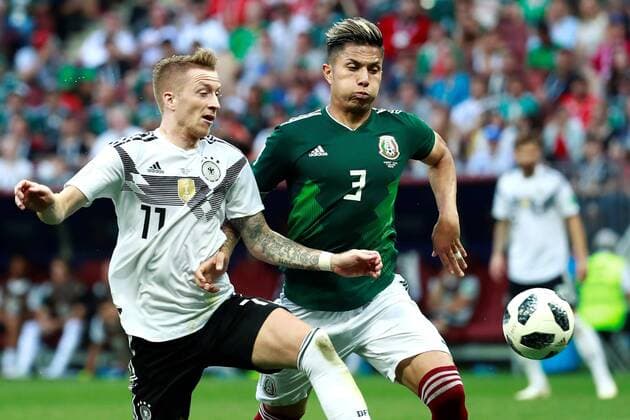 Mexican defender Carlos Salcedo (R) and German forward Marco Reus during the FIFA World Cup WM Weltmeisterschaft Fussball 2018 Group F soccer match between Germany and Mexico, in Moscow, Russia, 17 June 2018. GERMANY VS. MEXICO !ACHTUNG: NUR REDAKTIONELLE NUTZUNG!  Copyright: xJosexMendezx FWC09-147 20180617-636648575927824014