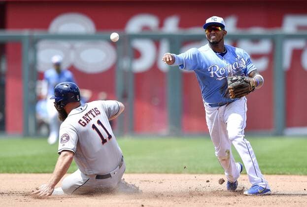 June 17, 2018 - Kansas City, MO, USA - Kansas City Royals shortstop Alcides Escobar forces out Houston Astros Evan Gattis and completes the double play on Brian McCann to end the top of the sixth inning on Sunday, June 17, 2018, at Kauffman Stadium in Kansas City, Mo. Houston Astros vs. Kansas City Royals - ZUMAm67_ 20180617_zaf_m67_024 Copyright: xJohnxSleezerx