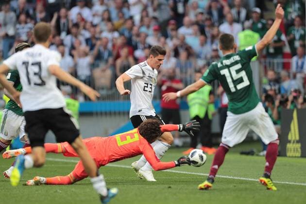 June 17, 2018 - Moscow, Russia - goalkeeper Guillermo Ochoa of Mexico national team Nationalteam and forward Mario Gomez of Germany National team during a Group F 2018 FIFA World Cup WM Weltmeisterschaft Fussball soccer match between Germany and Mexico on June 16, 2018, at the Kazan Arena in Kazan, Russia. Germany v Mexico: Group F - 2018 FIFA World Cup Russia  - ZUMAn230 20180617_zaa_n230_860 Copyright: xAnatolijxMedvedx