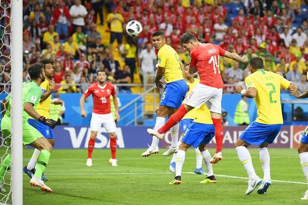 Football: Brazil vs Switzerland at World Cup Steven Zuber (2nd from R) of Switzerland heads the equalizer against Brazil during the second half of a World Cup group stage match in the southern Russian city of Rostov-on-Don on June 17, 2018. 