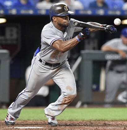 June 18, 2018 - Kansas City, MO, USA - Texas Rangers Delino DeShields lays down a bunt RBI single to score Jurickson Profar in the eighth inning during Monday s baseball game against the Kansas City Royals on June 18, 2018, at Kauffman Stadium in Kansas City, Mo. The Rangers won, 6-3. Rangers beat Royals 6-3 - ZUMAm67_ 20180618_zaf_m67_019 Copyright: xJohnxSleezerx