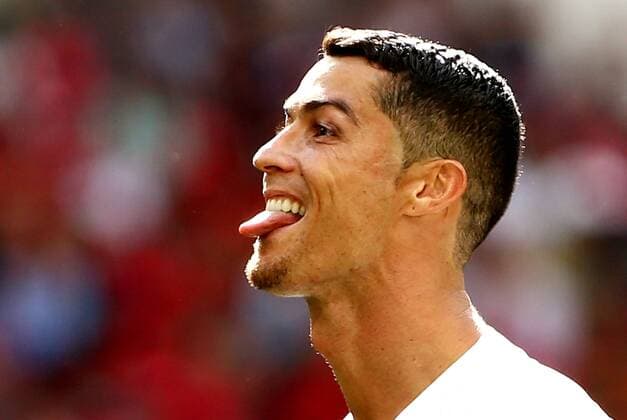 Bilder des Tages - SPORT Cristiano Ronaldo zeigt Zunge aug Messi-Rufe Fußball Fussball FIFA WM Weltmeisterschaft Russland Russia 2018 Saison 2017 2018 20.06.2018 Portugal POR vs. Marokko MAR *** Cristiano Ronaldo shows tongue aug Messi shouts Sports Football Soccer FIFA World Cup Russia Russia 2018 Season 2017 2018 20 06 2018 Portugal POR vs Morocco MAR