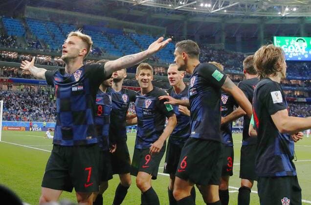 Football: Argentina vs Croatia at World Cup Ivan Rakitic (far L) of Croatia celebrates after scoring his side s third goal during the second half of Croatia s 3-0 win over Argentina in a World Cup Group D match in Nizhny Novgorod, Russia, on June 21, 2018. 