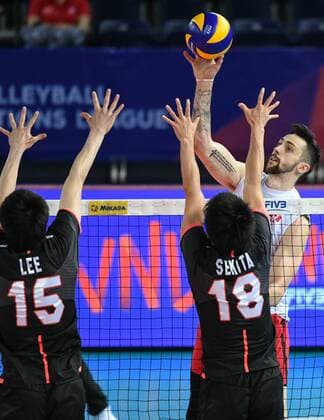 (180624) -- JIANGMEN, June 24, 2018 -- Stephen Timothy Maar (R) of Canada spikes the ball during a match against Japan at the FIVB Volleyball Nations League 2018 men s tournament in Jiangmen, south China s Guangdong Province, June 24, 2018. Canada won 3-0. ) (SP)CHINA-JIANGMEN-VOLLEYBALL-FIVB NATIONS LEAGUE-MEN (CN) DengxHua 