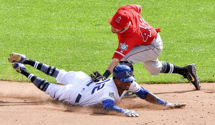 June 25, 2018 - Kansas City, MO, USA - Kansas City Royals Rosell Herrera is tagged out by Los Angeles Angels second baseman Ian Kinsler trying to steal in the sixth inning during Monday s baseball game on June 25, 2018, at Kauffman Stadium in Kansas City, Mo. Angels vs Royals - ZUMAm67_ 20180625_zaf_m67_024 Copyright: xJohnxSleezerx