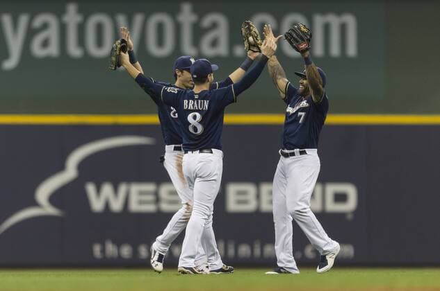 June 26, 2018: Milwaukee Brewers outfielders Ryan Braun 8, Christian Yelich 22, and Eric Thames 7 celebrate a 5-1 win. Brewers outfielders combined for 6 of the 9 hits and 4 of the 5 runs in the Major League Baseball game between the Milwaukee Brewers and the Kansas City Royals at Miller Park in Milwaukee, WI. CSM MLB Baseball Herren USA 2018 Royals vs Brewers JUN 26 - ZUMAc04_ 20180626_zaf_c04_054 Copyright: xJohnxFisherx