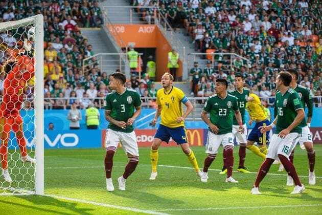 180627 goalkeeper Guillermo Ochoa of Mexico with a save in front of Andreas Granqvist of Sweden during the FIFA World Cup WM Weltmeisterschaft Fussball group stage match between Mexico and Sweden on June 27, 2018 in Ekaterinburg. Photo: Petter Arvidson BILDBYRN kod PA 87737 Copyright: PETTERxARVIDSON BB180627PA044