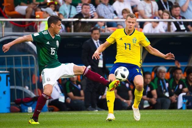 180627 Hector Moreno of Mexico and Viktor Claesson of Sweden during the FIFA World Cup WM Weltmeisterschaft Fussball group stage match between Mexico and Sweden on June 27, 2018 in Ekaterinburg. Photo: Petter Arvidson BILDBYRN kod PA 87737 Copyright: PETTERxARVIDSON BB180627PA061