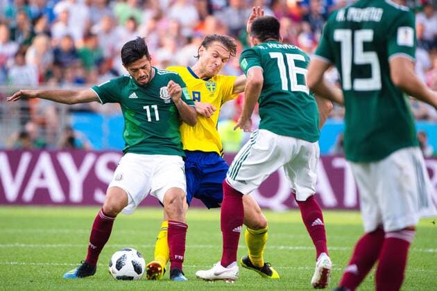 180627 Carlos Vela and Hector Herrera of Mexico against Albin Ekdal of Sweden during the FIFA World Cup WM Weltmeisterschaft Fussball group stage match between Mexico and Sweden on June 27, 2018 in Ekaterinburg. Photo: Joel Marklund BILDBYRN kod JM 87737 Copyright: JOELxMARKLUND BB180627JM052