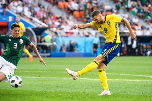 180627 Carlos Salcedo of Mexico and Marcus Berg of Sweden during the FIFA World Cup WM Weltmeisterschaft Fussball group stage match between Mexico and Sweden on June 27, 2018 in Ekaterinburg. Photo: Petter Arvidson BILDBYRN kod PA 87737 Copyright: PETTERxARVIDSON BB180627PA081