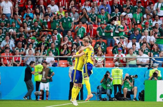 Swedish defender Ludwig Augustinsson (L) celebrates with teammate Swedish forward Ola Toivonen after scoring during the FIFA World Cup WM Weltmeisterschaft Fussball 2018 Group F soccer match between Mexico and Sweden, in Ekaterinburg, Russia, 27 June 2018. MEXICO VS. SWEDEN !ACHTUNG: NUR REDAKTIONELLE NUTZUNG!  Copyright: xJosexMendezx FWC42-117 20180627-636657169044672567