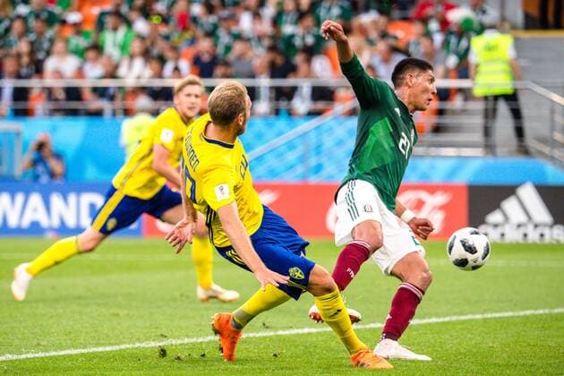 180627 Ola Toivonen of Sweden scores the 0-3 goal via Edson Alvarez of Mexico during the FIFA World Cup WM Weltmeisterschaft Fussball group stage match between Mexico and Sweden on June 27, 2018 in Ekaterinburg. Photo: Petter Arvidson BILDBYRN kod PA 87737 Copyright: PETTERxARVIDSON BB180627PA124