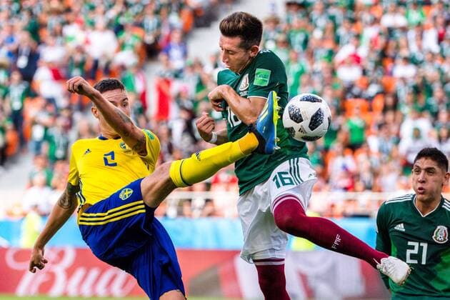 180627 Mikael Lustig of Sweden and Hector Herrera of Mexico during the FIFA World Cup WM Weltmeisterschaft Fussball group stage match between Mexico and Sweden on June 27, 2018 in Ekaterinburg. Photo: Joel Marklund BILDBYRN kod JM 87737 Copyright: JOELxMARKLUND BB180627JM144
